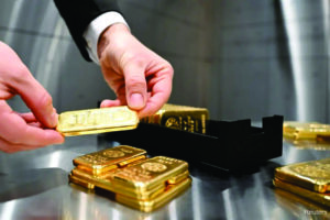 Gold ticks up on softer dollar after Iran peace proposal report.