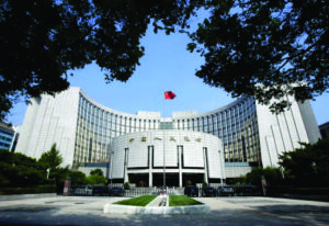 China’s central bank debuts overnight reverse repo operation, withholding key interest rate.